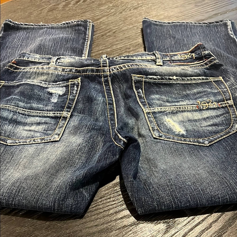 Blue Relaxed Fit Jeans with Vintage Distressing